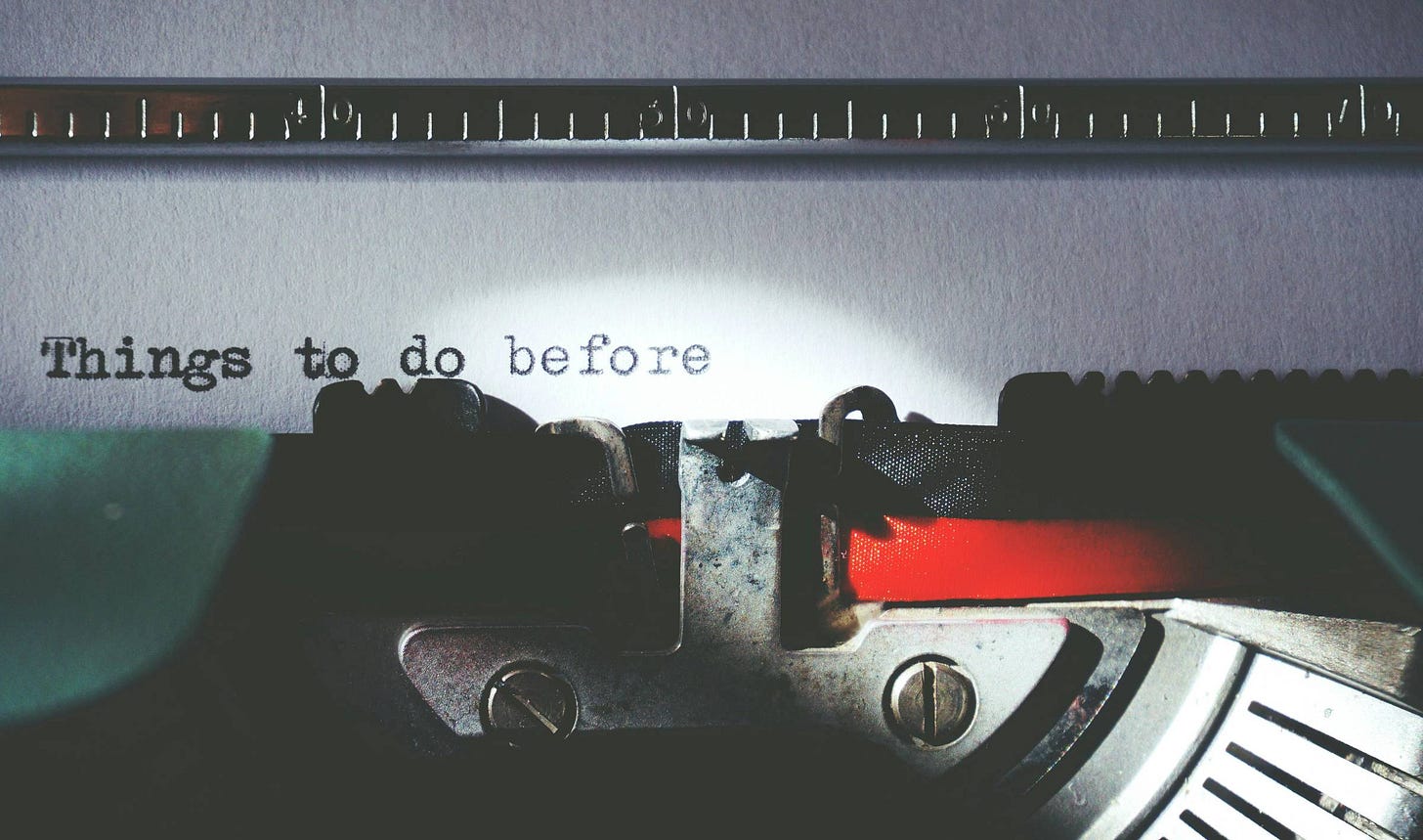  A close-up of a typewriter with "Things to do before" typed on paper—representing the hierarchy of health interventions and the importance of fixing foundational levers first before adding smaller optimizations. order of operations for longevity.