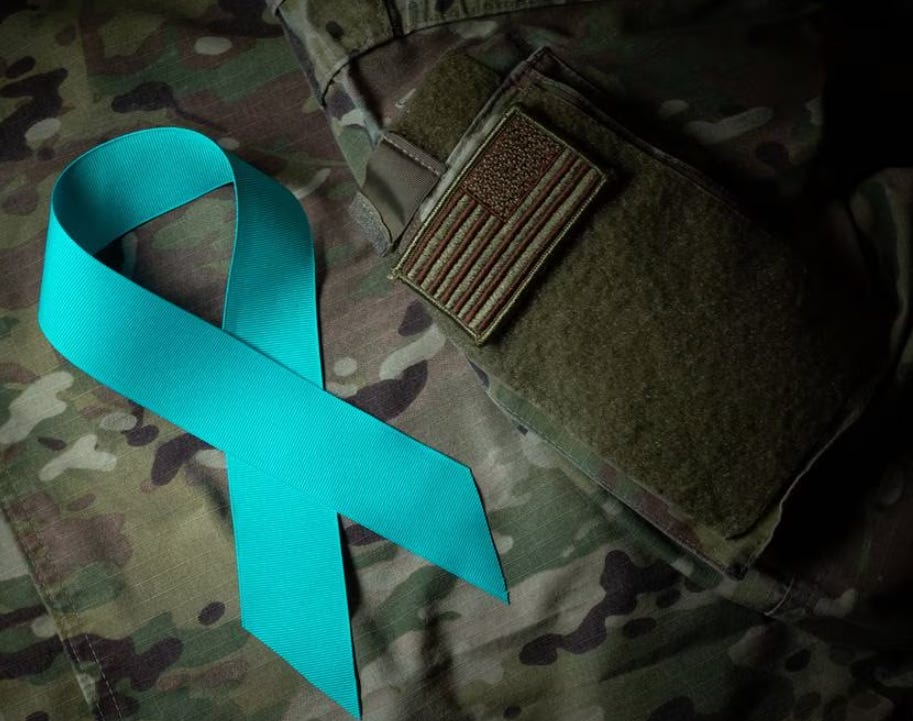 teal ribbon crossed in a loop signifying a survivor of military sexual assault