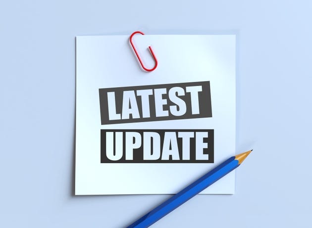 Text of LATEST UPDATE. Business, education, financial and up to date concept.