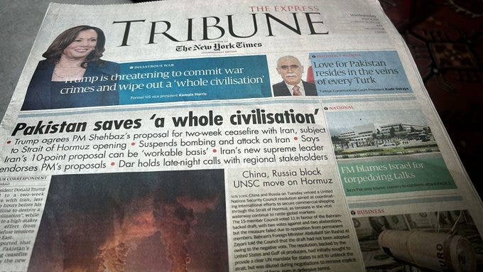 A high-angle photograph of the printed front page of The Express Tribune newspaper, featuring the headline 'Pakistan saves a whole civilisation'. A high-angle photograph of the printed front page of The Express Tribune newspaper, featuring the headline 'Pakistan saves a whole civilisation'.