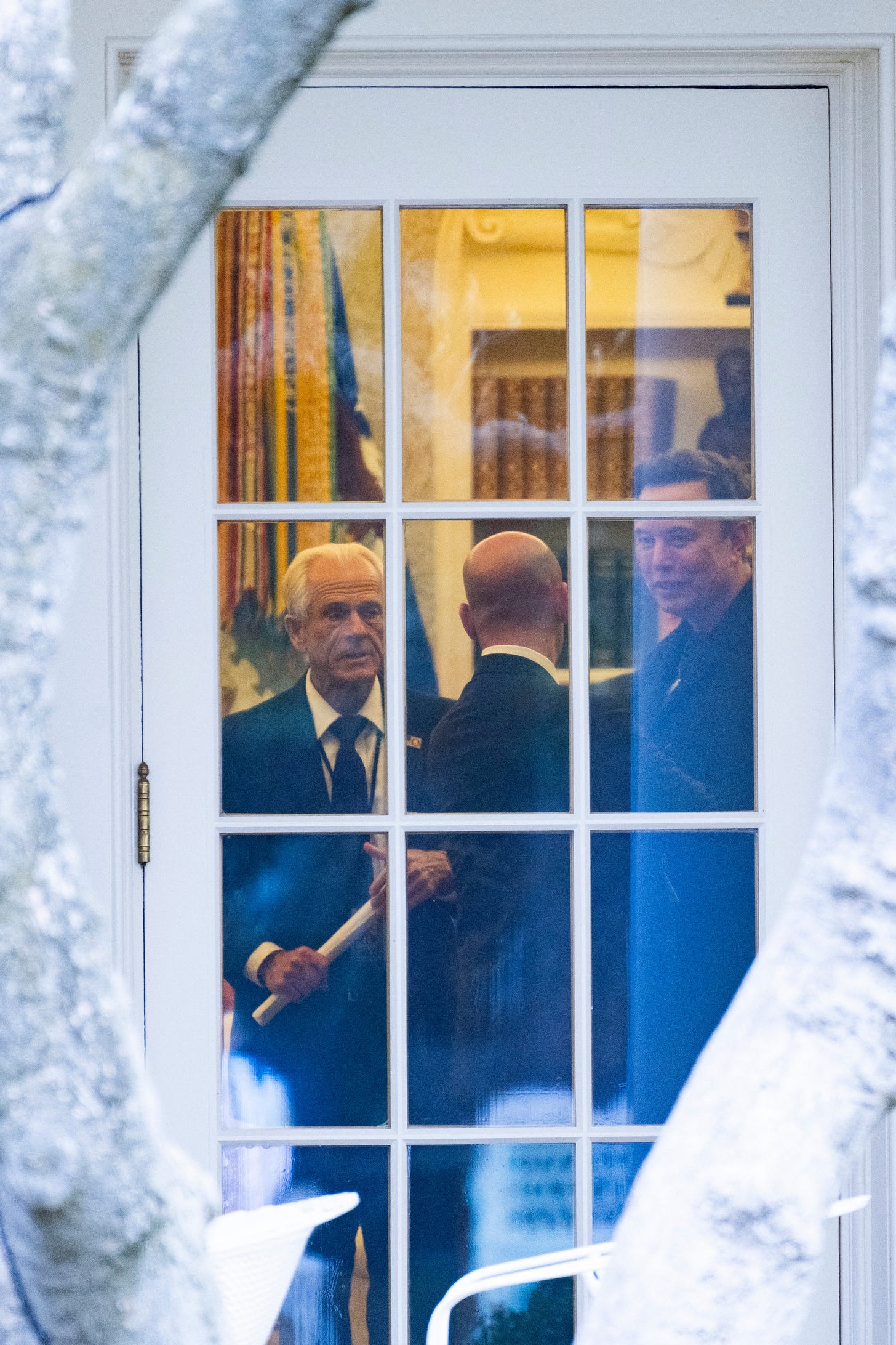 Peter Navarro with Musk and Stephen Miller in the White House last month