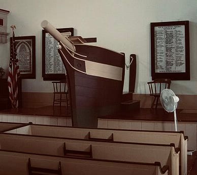 The pulpit of a church, designed in the form of a ship's prow.