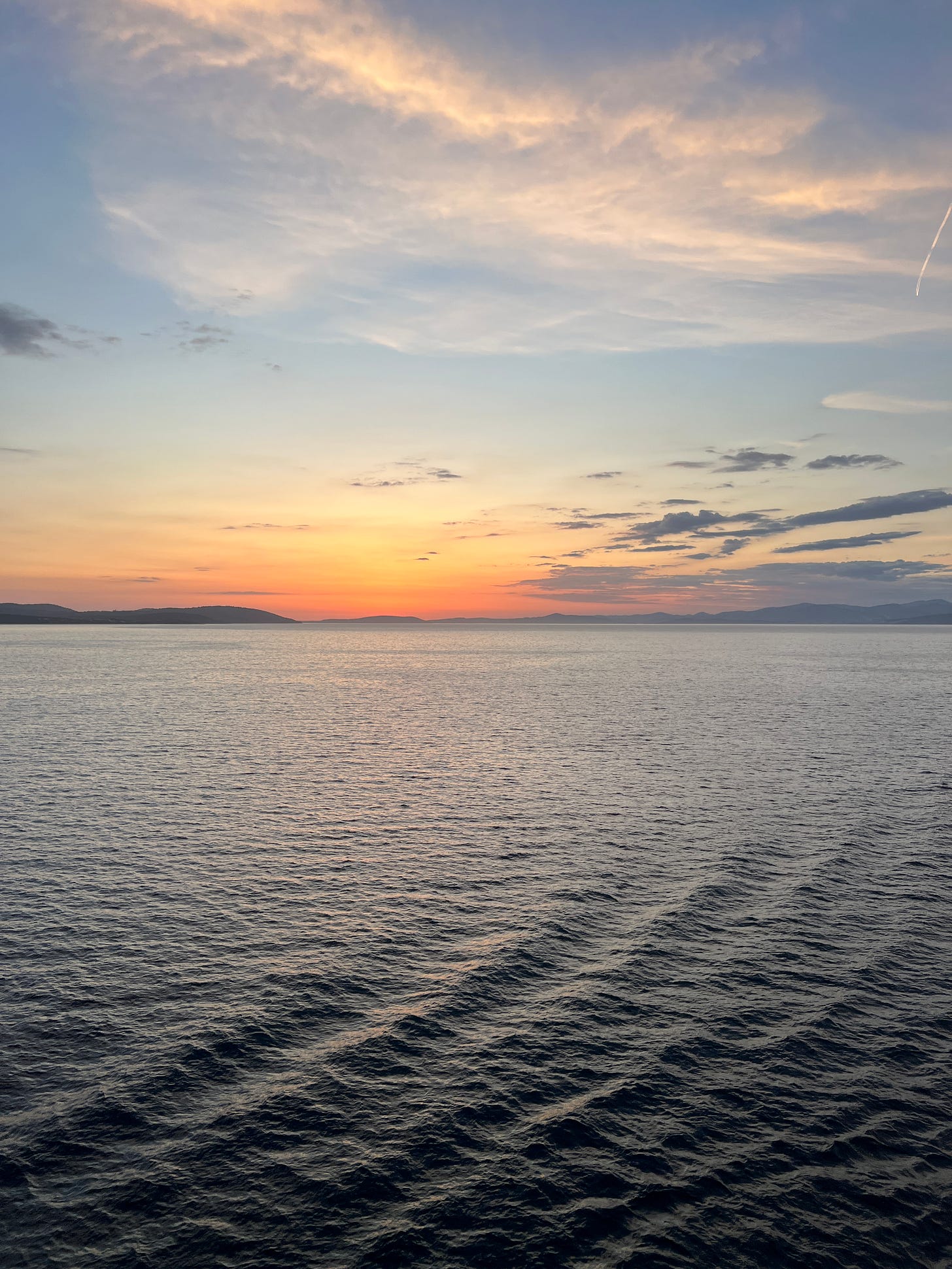 Sunset at sea. View from the balcony of our cruise ship