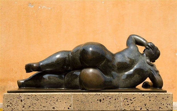 Statue of a woman reclining by Fernando Botero in the Plaza de Santo Domingo, Cartagena de Indias, Colombia Statue of a woman reclining by Fernando Botero in the Plaza de Santo Domingo, Cartagena de Indias, Colombia
