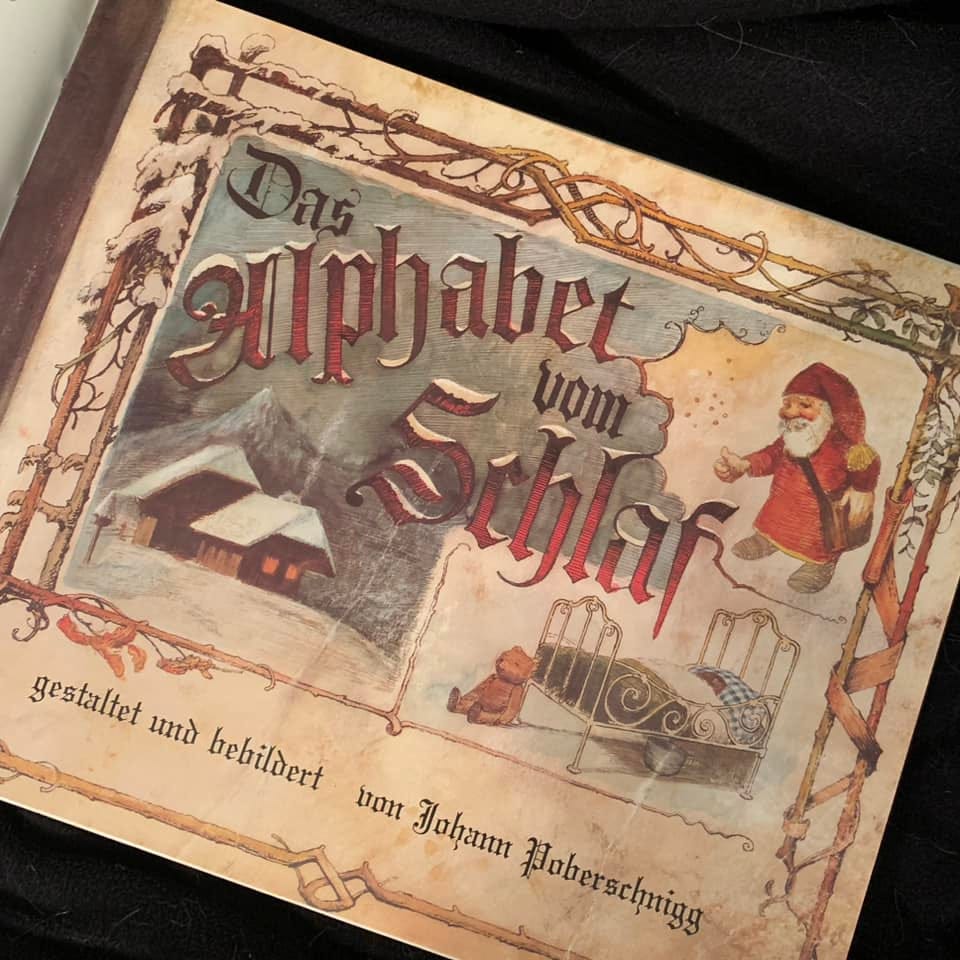 May be an image of book and text