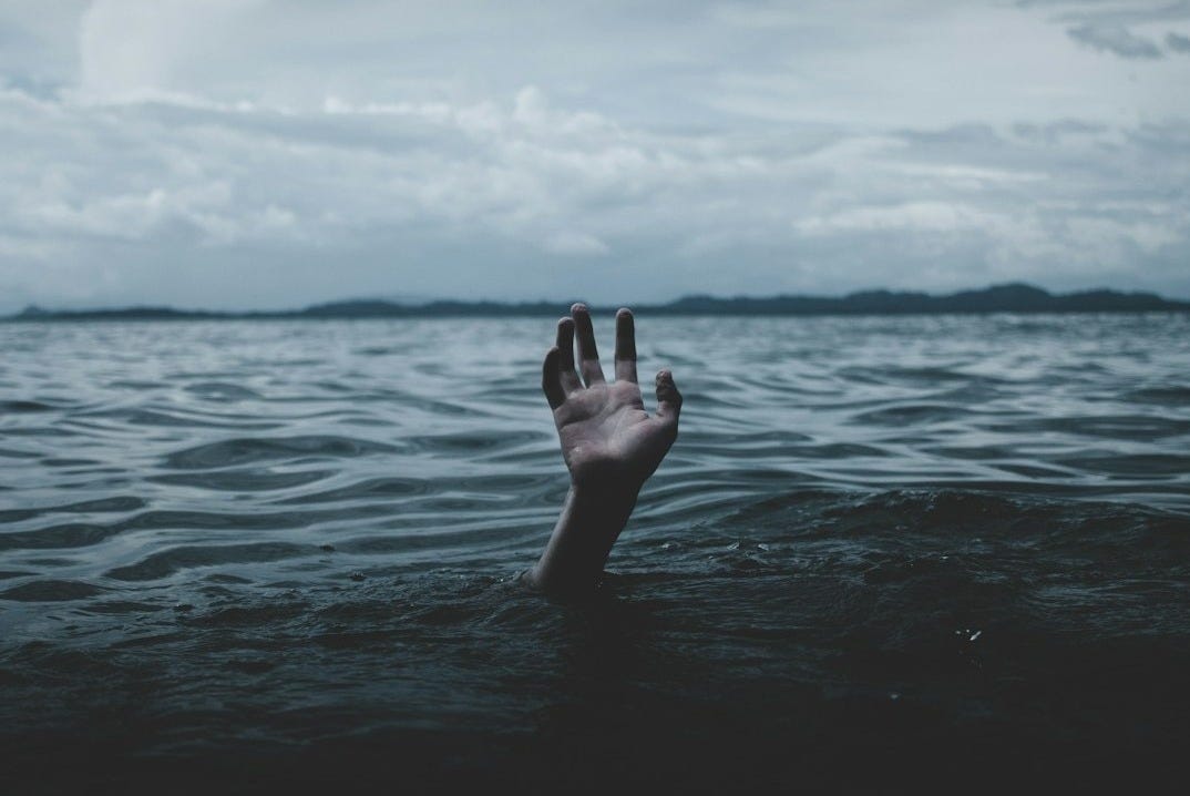 a person drowns underwater