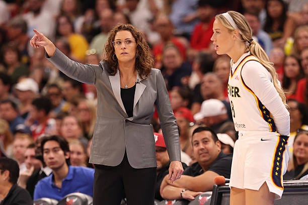 Head coach Stephanie White of the Indiana Fever looks on as Sophie Cunningham checks in against the Chicago Sky during the second half at United... Head coach Stephanie White of the Indiana Fever looks on as Sophie Cunningham checks in against the Chicago Sky during the second half at United...