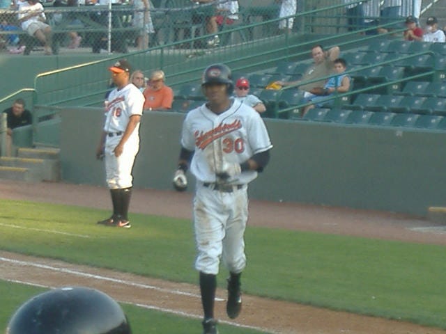 A dirty David Cash trots back to the dugout during an early August game. A dirty David Cash trots back to the dugout during an early August game.