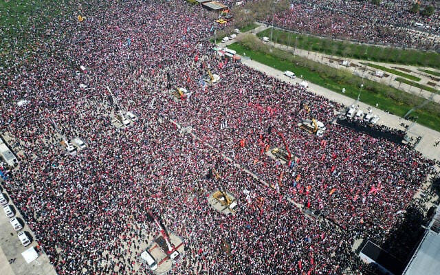 This handout photograph taken and released by the Republican People's Party (CHP) press office on March 29, 2025, shows an aerial view of a large crowd gathering during a rally called by the CHP, Turkey's main opposition party, in support of Istanbul's arrested mayor Ekrem Imanoglu in Maltepe, on the outskirts of Istanbul. (HANDOUT / Republican People's Party (CHP) Press Service / AFP)