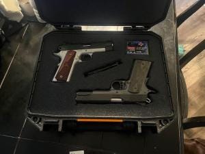 Pelican Vault with two pistols