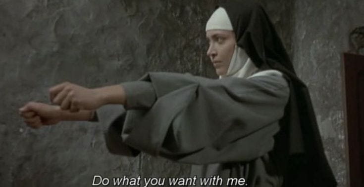 This may contain: a nun pointing at something with the words do what you want with me
