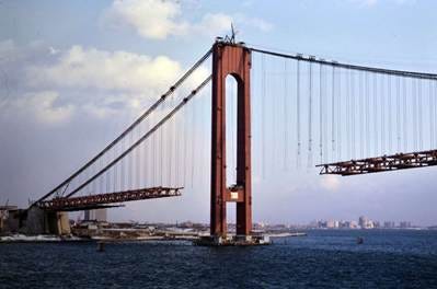 r/nyc - a large bridge with a large bridge in the background