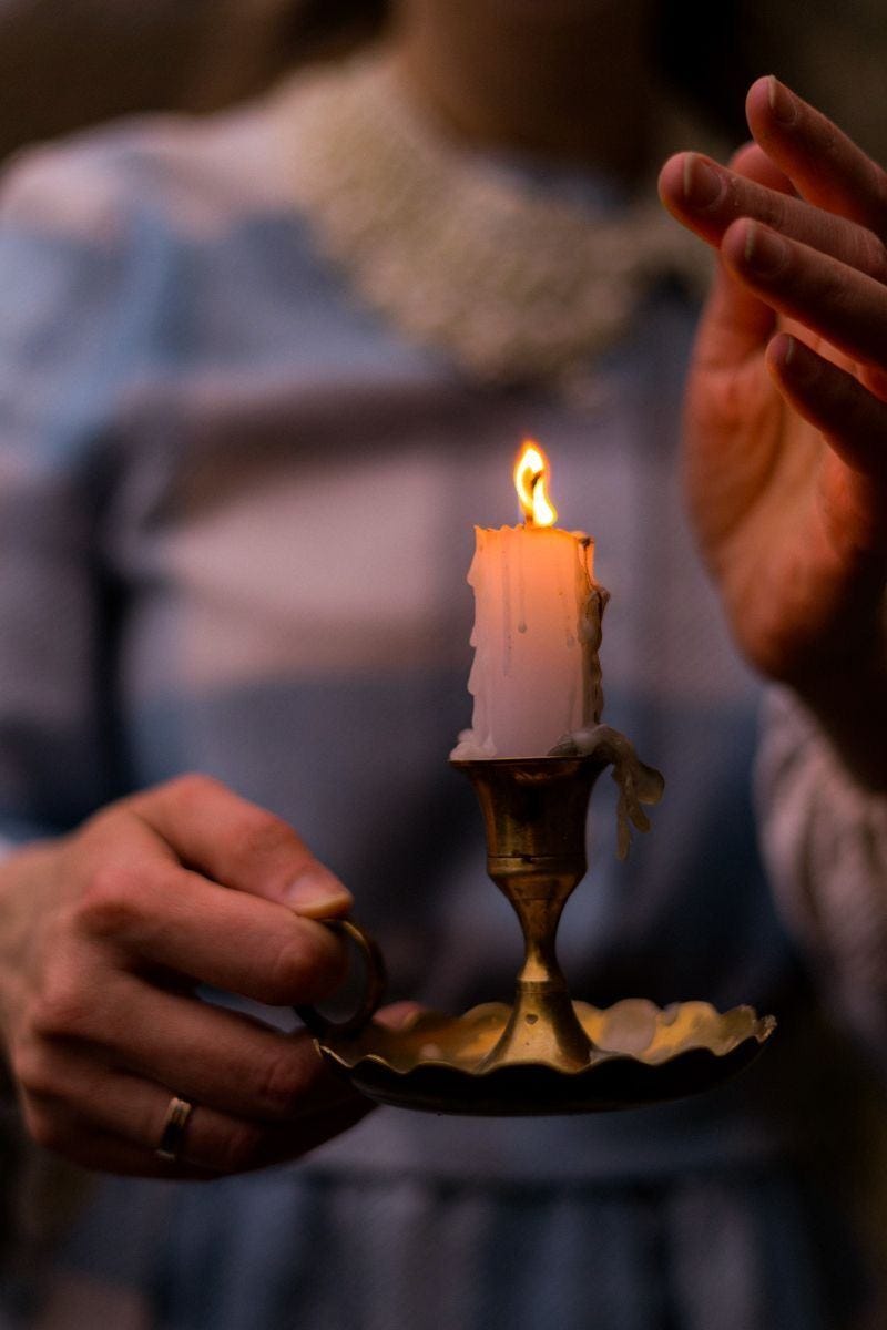 May be an image of candle holder and fire