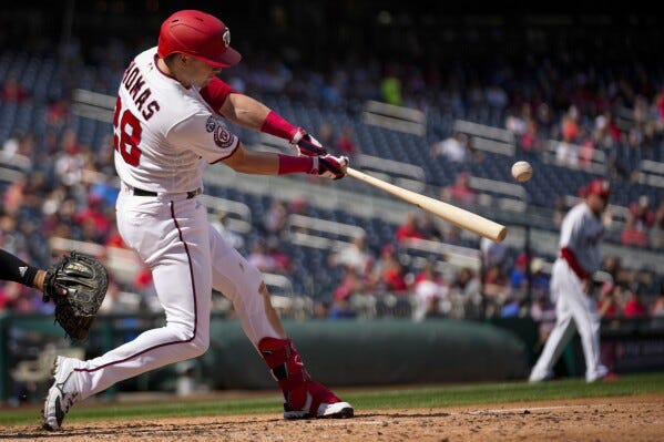 Lane Thomas' grand slam helps Nationals blast White Sox 13-3. Josiah Gray  gets the win | AP News