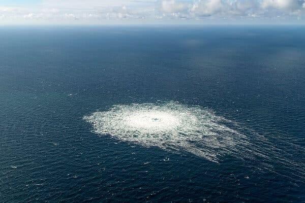 An aerial view of the surface of the Baltic Sea with a wide mass of bubbles caused by a methane leak. An aerial view of the surface of the Baltic Sea with a wide mass of bubbles caused by a methane leak.