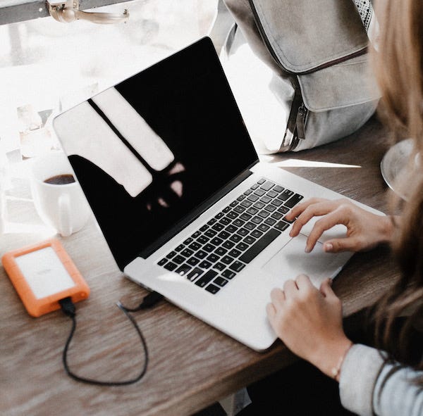 Photo of laptop with person typing andrew-neel-ute2XAFQU2I-unsplash.jpeg 