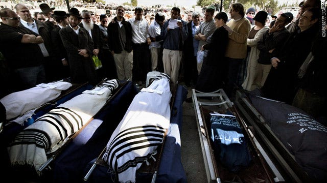 https://i.cdn.turner.com/cnn/2011/WORLD/meast/03/13/west.bank.family.killed/t1larg.israeli.funeral.gi.jpg