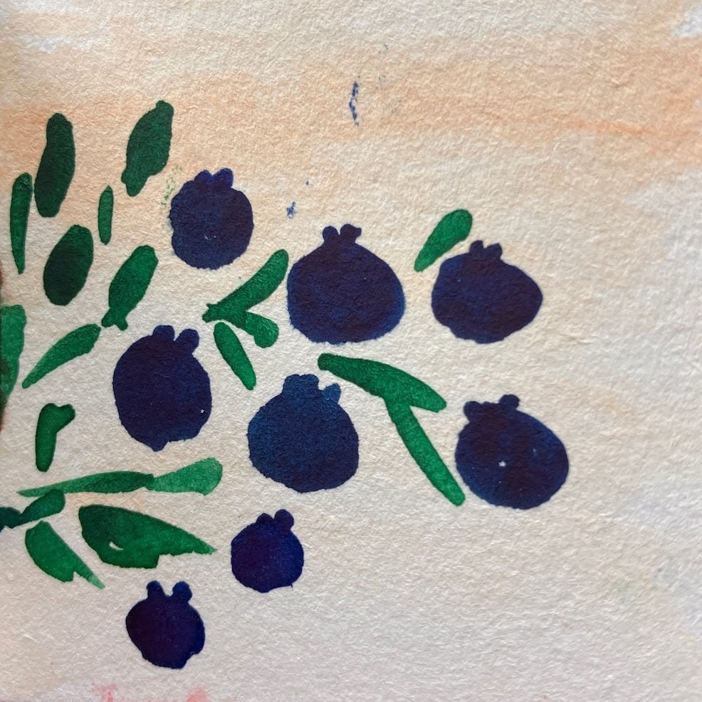 watercolor of blueberries and green leaves