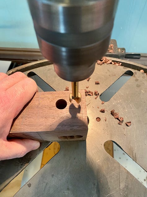 Making the legs involves laying out and cutting the mortises, cutting the tenons in the aprons, and then cutting the tapers on the legs