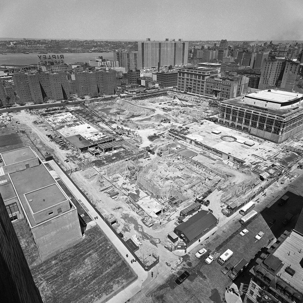 General view of Lincoln Center for the Performing Arts looking northwest from West 61st Street and Ninth Avenue, New York City on May 10, 1962. Large building at top right is Philharmonic Hall. Area in front of the Philharmonic building is to be an underground garage. Building at left is part of Fordham University. In right center is part of building of the New York State Theater for the dance. General view of Lincoln Center for the Performing Arts looking northwest from West 61st Street and Ninth Avenue, New York City on May 10, 1962. Large building at top right is Philharmonic Hall. Area in front of the Philharmonic building is to be an underground garage. Building at left is part of Fordham University. In right center is part of building of the New York State Theater for the dance.