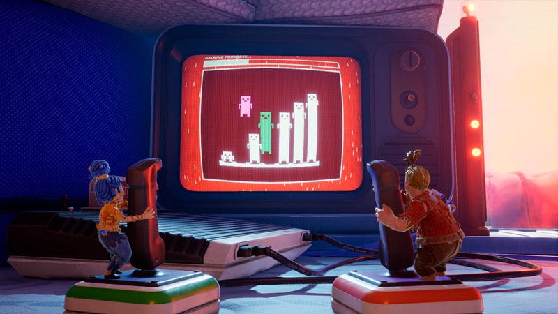 Protagonistas de It Takes Two, duas bonecas, jogam videogame