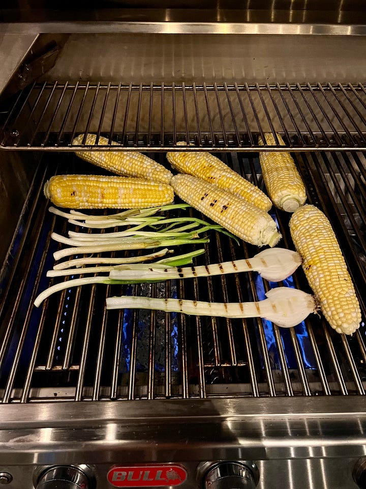 Grilled corn and scallions for summer grilled corn salad with feta cheese