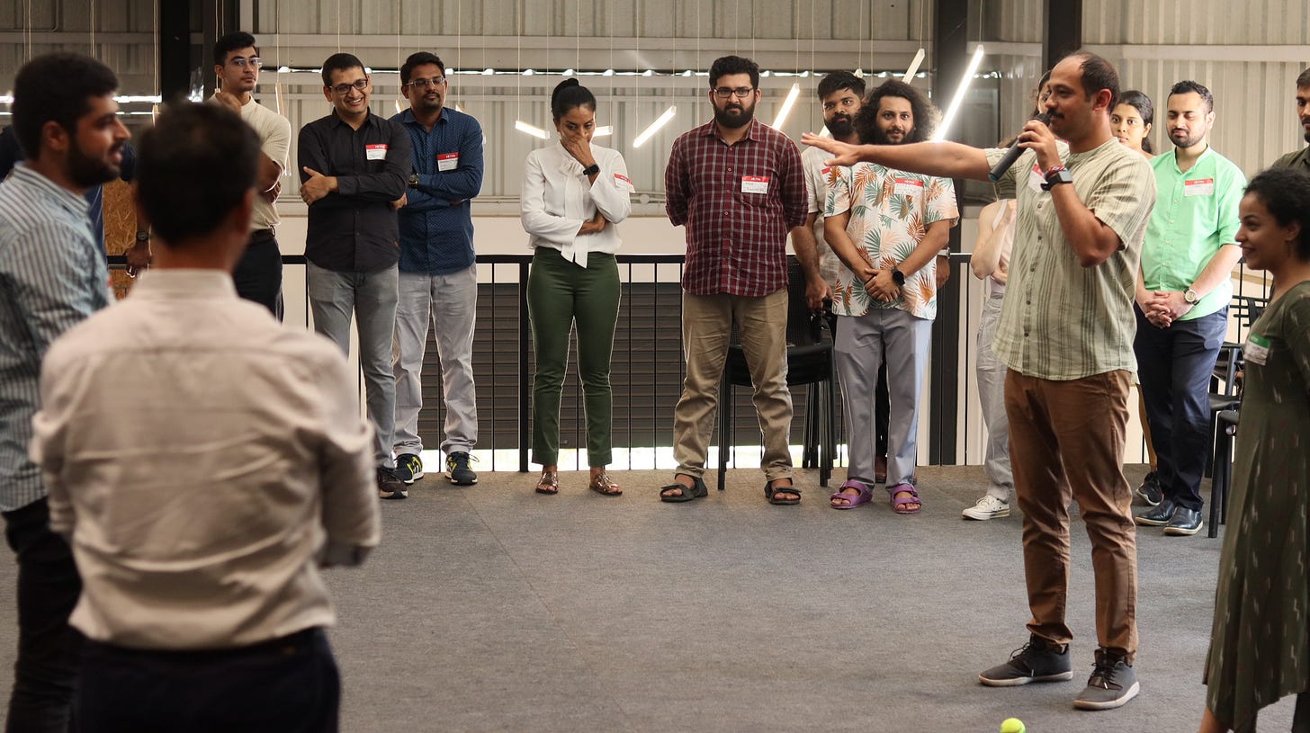 A group of people standing in a room