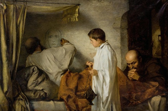 A room with three figures, two in white robes and one in brown, near a bed with orange and gray blankets. One figure in a white robe paints a face on a wall. Another figure in a white robe stands holding objects, while the third figure in brown lies on the bed, appearing contemplative.