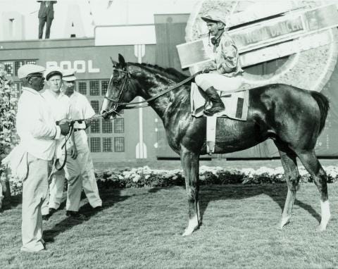 Northern Dancer and jockey Willie Shoemaker in the Gulfstream Park winner's circle after winning the Florida Derby.