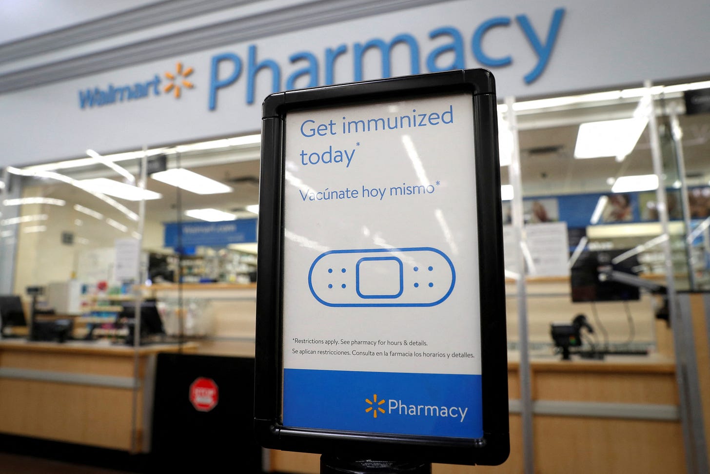 Walmart is raising wages for pharmacists, opticians in healthcare push |  Reuters