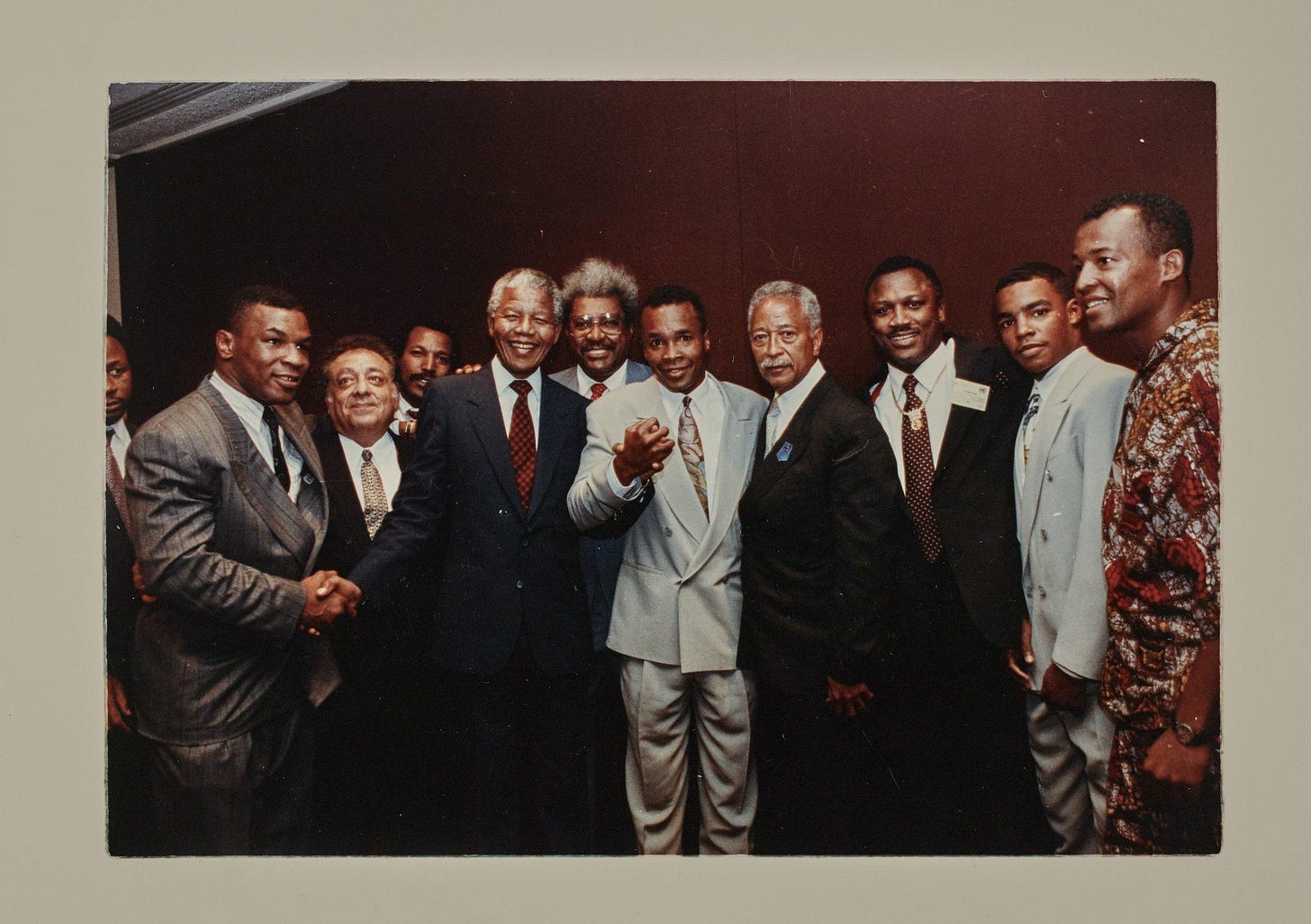 Boxing legends Mike Tyson, Sugar Ray Leonard, and Joe Frazier meet Nelson Mandela in 1990 during his international anti-apartheid tour, the year of his release, joined by Don King and Mayor David Dinkins.