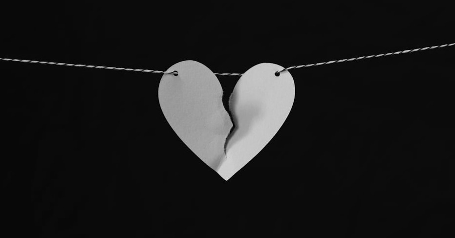 broken heart hanging on wire broken heart hanging on wire