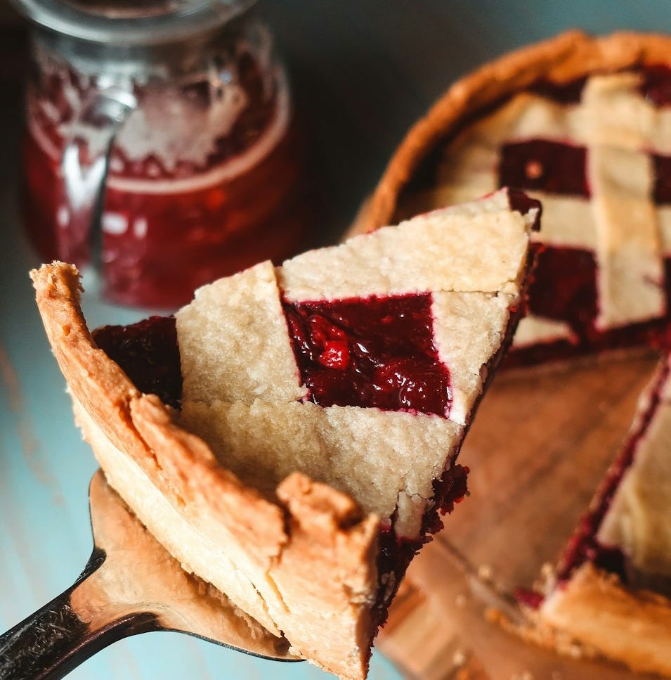 stainless steel spoon on brown bread