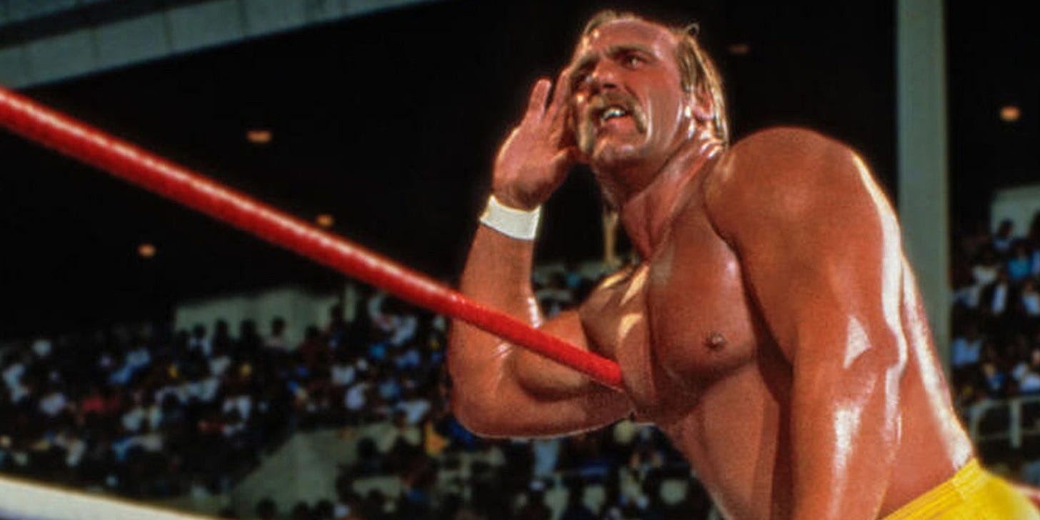 Hulk Hogan listening to a crowd at a live event Hulk Hogan listening to a crowd at a live event