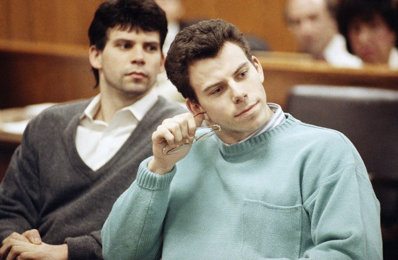Lyle, left, and Erik Menendez appear for a court hearing in Beverly Hills, California, in 1991. (Kevork Djansezian/AP)