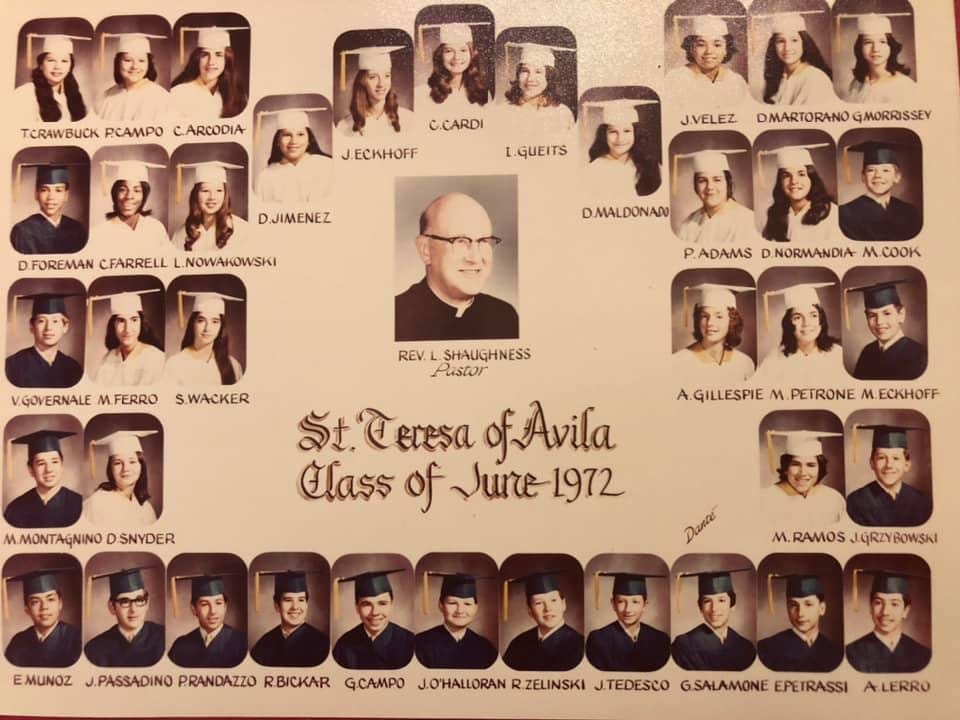 Photo of grammar school students in their graduation gowns