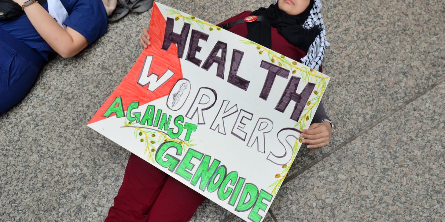 CHICAGO, UNITED STATES - NOVEMBER 16: Pro-Palestinian demonstrators from healthcare workers gather to demonstrate against Israeli airstrike on hospitals in front of Federal Plaza in Chicago, Illinois, United States on November 16, 2023. (Photo by Jacek Boczarski/Anadolu via Getty Images)