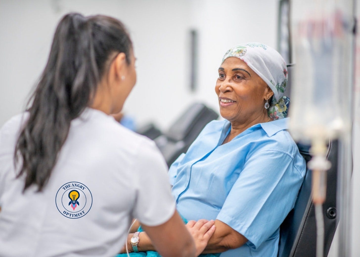 A cancer patient talking with a nurse A cancer patient talking with a nurse