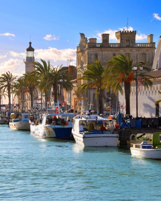 May be an image of Camogli and bell tower