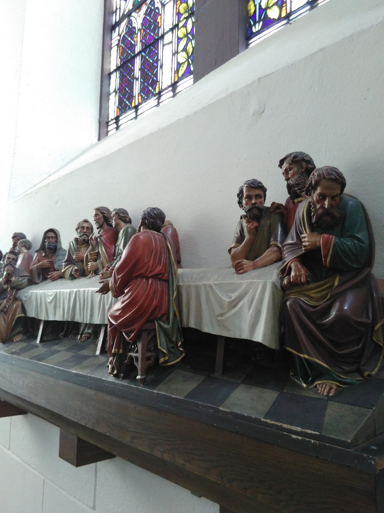 looking down the table at the Last Supper