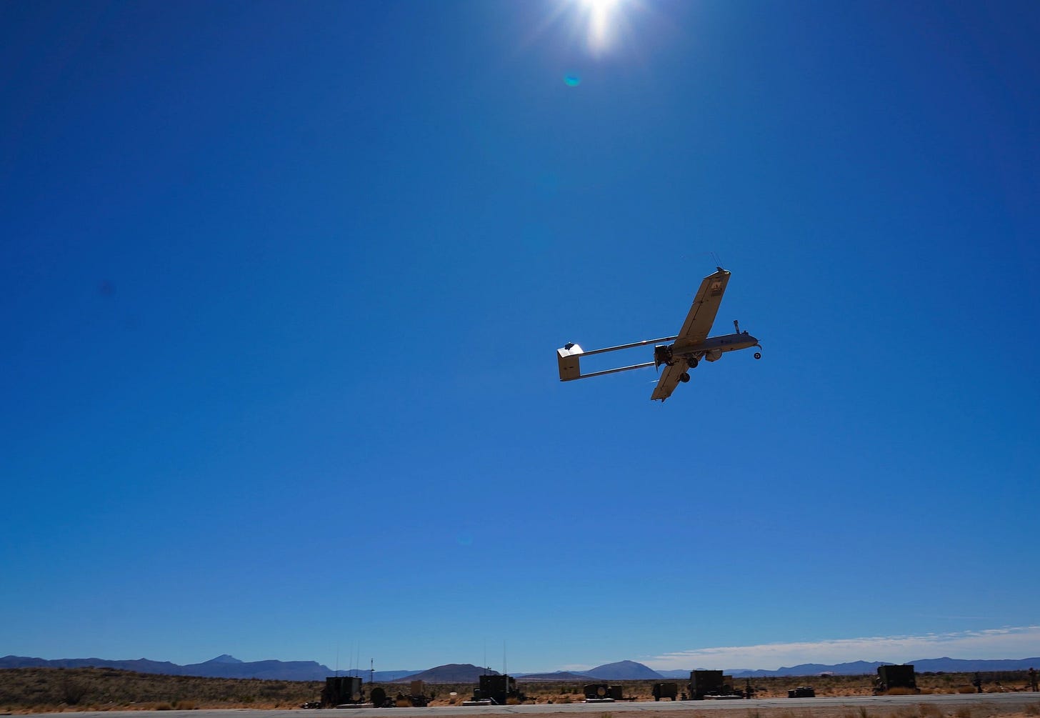 An RQ-7 Shadow reconnaissance drone is launched from its catapult during a training exercise