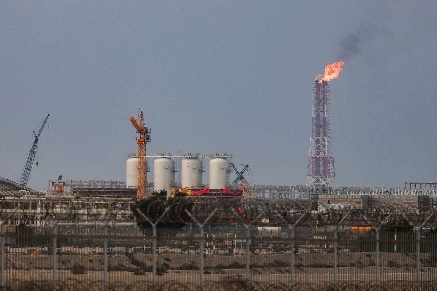 Iran War: Qatar's Ras Laffan LNG Plant Hit by Missile, Extensively Damaged  - Bloomberg