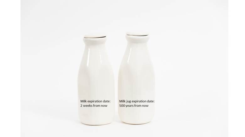 A couple of white milk bottles

Description automatically generated
