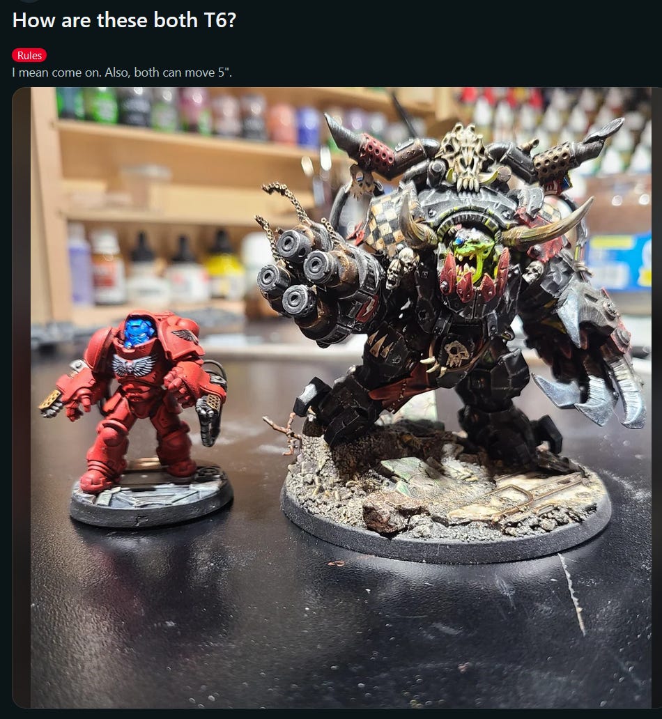 A reddit post featuring a comparison in size between a red Gravis marine and Ghazghkull Thraka. A reddit post featuring a comparison in size between a red Gravis marine and Ghazghkull Thraka.