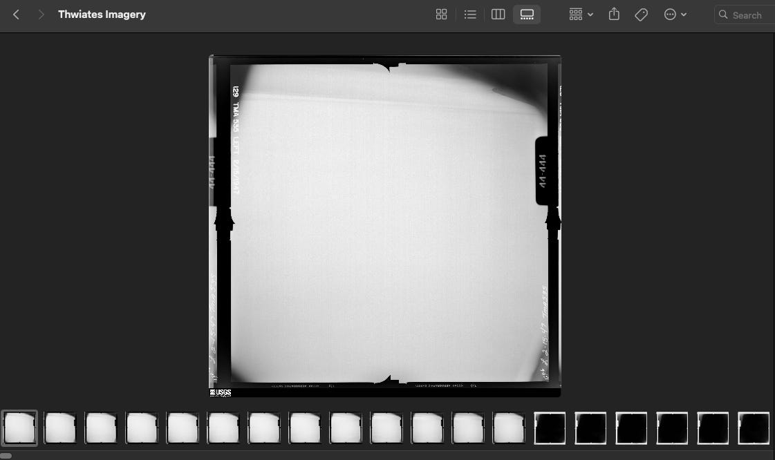 A screenshot of Finder in gallery mode, showing a picture in the middle and the small, square thumbnails, which are almost all white or all black, in a row on the bottom.