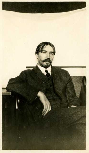 a photo of thorstein veblen, a european white dude with a large mustache and serious big dick energy