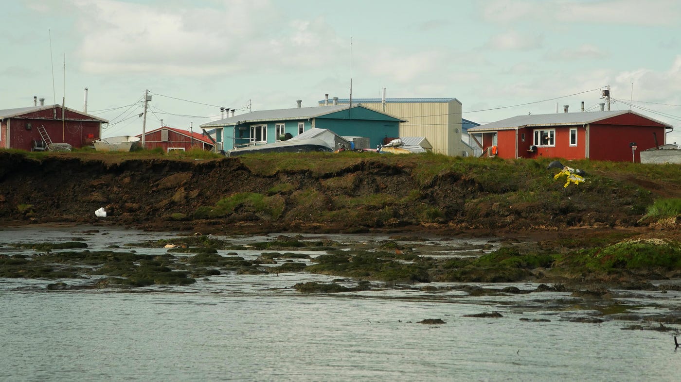 Modest Native Alaskan village too close to eroding shore line Modest Native Alaskan village too close to eroding shore line