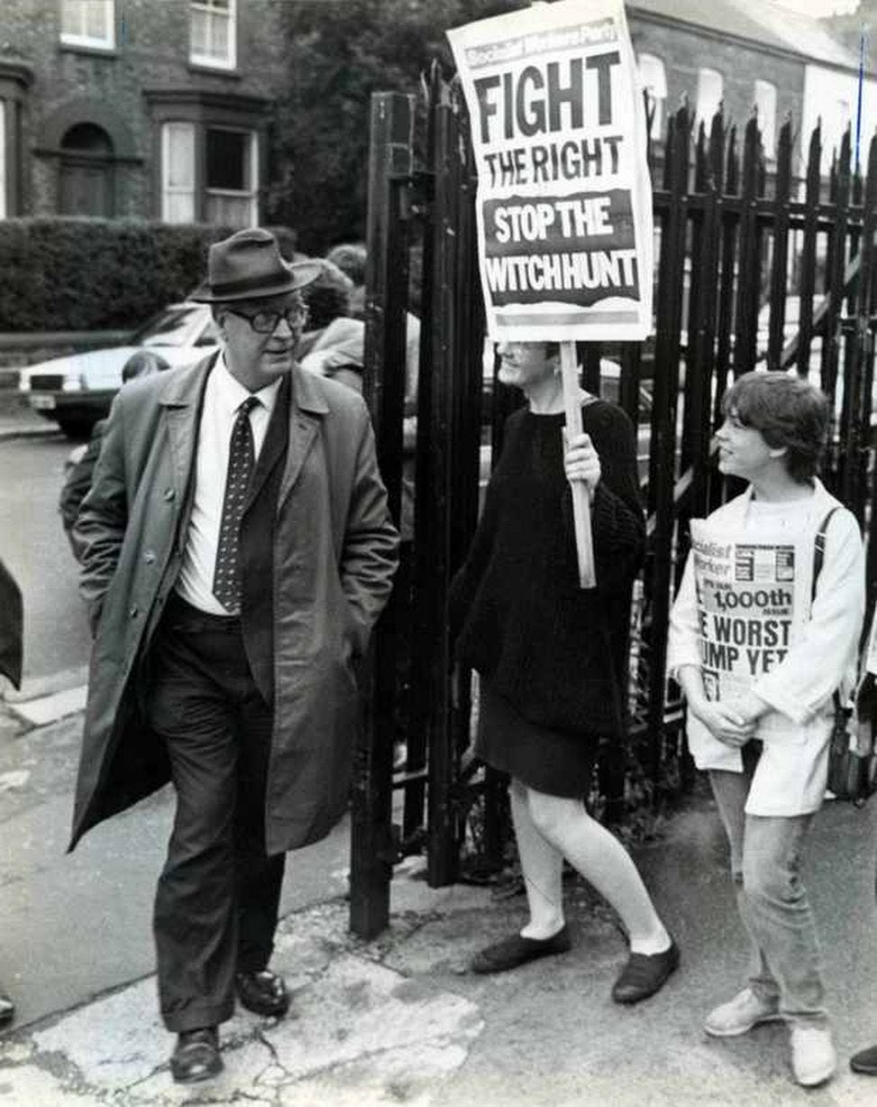 Militant 30th anniversary.Cllr John Hamilton is greeted by protestors as he walks into a meeting. August 1986.