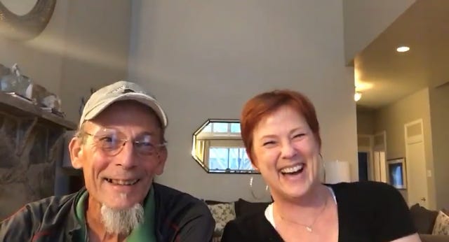 Amy Jones laughing with her father during a video call from her home in Dallas