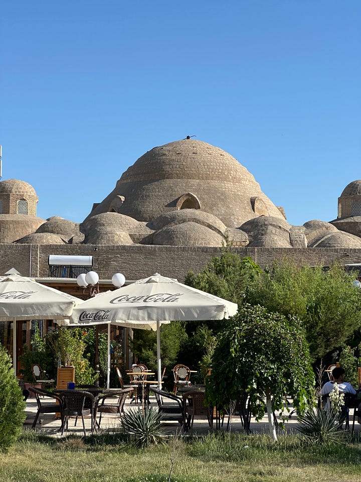 One of the few remaining pools in Bukhara and a nearby trading dome